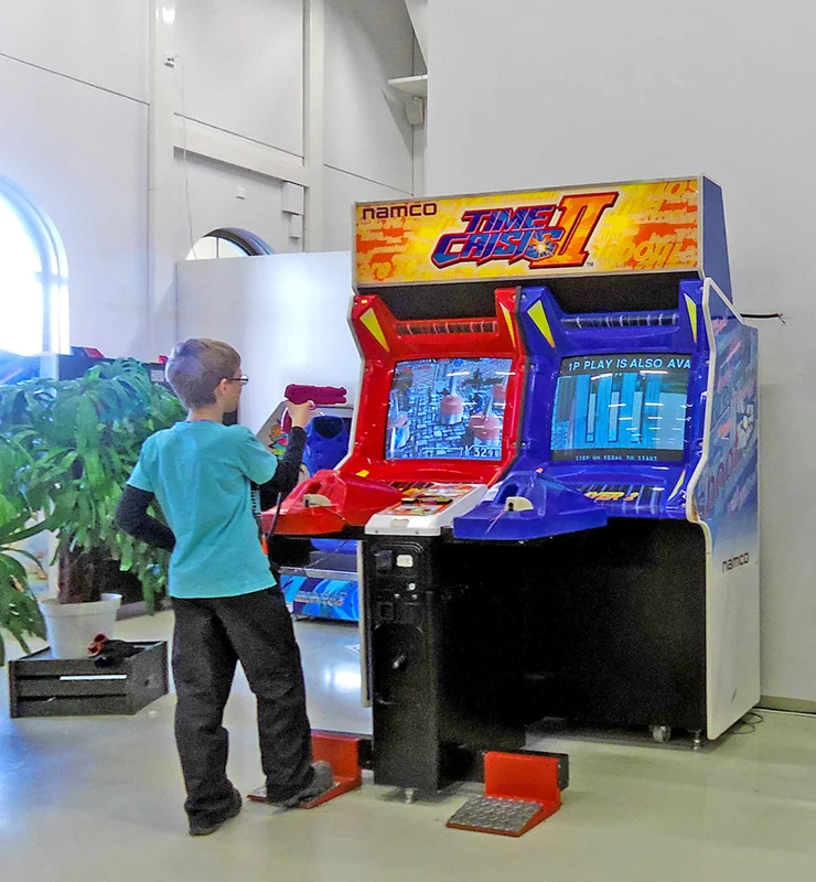 Time Crisis II twin light-gun cabinet in an arcade