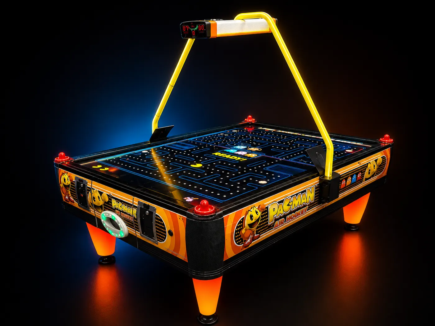 Close-up of the Pac-Man Air Hockey playfield and pushers