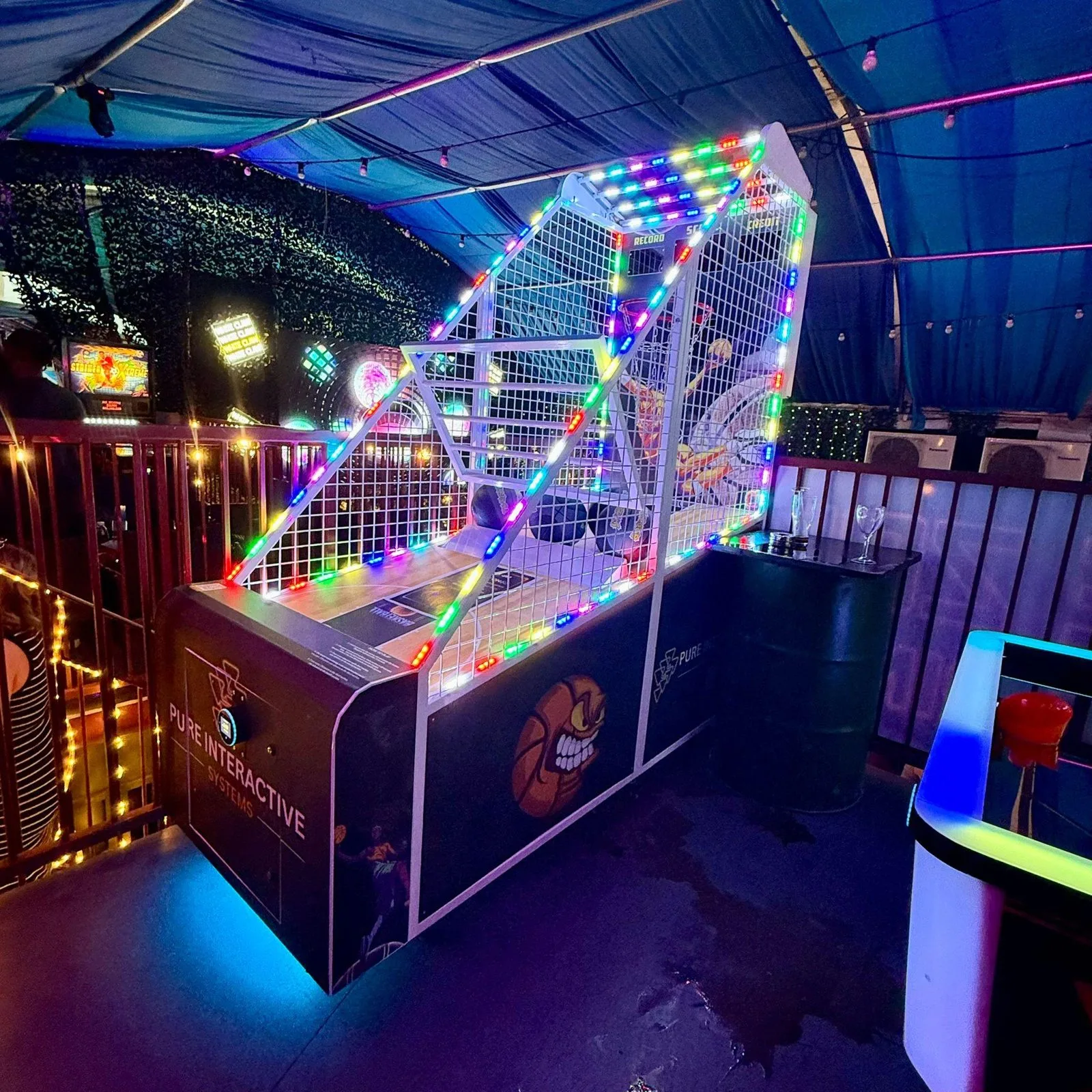 Power Hoops basketball machine in play on the floor at Fire, Vauxhall
