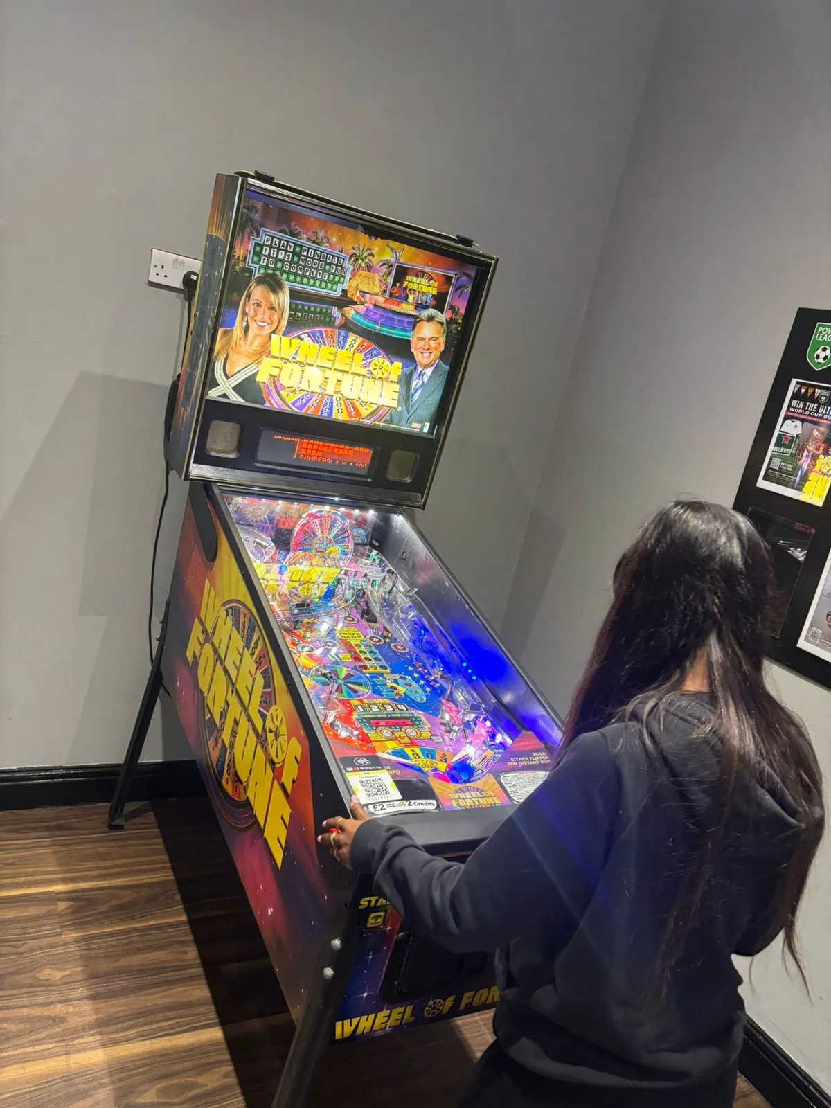 Stern Wheel of Fortune pinball being played at Powerleague Mill Hill