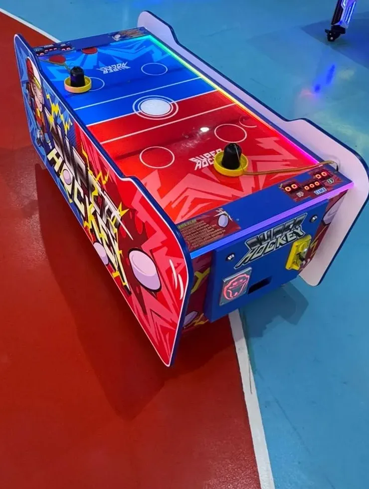 Super Hockey red and blue kids' air hockey table with joystick controls